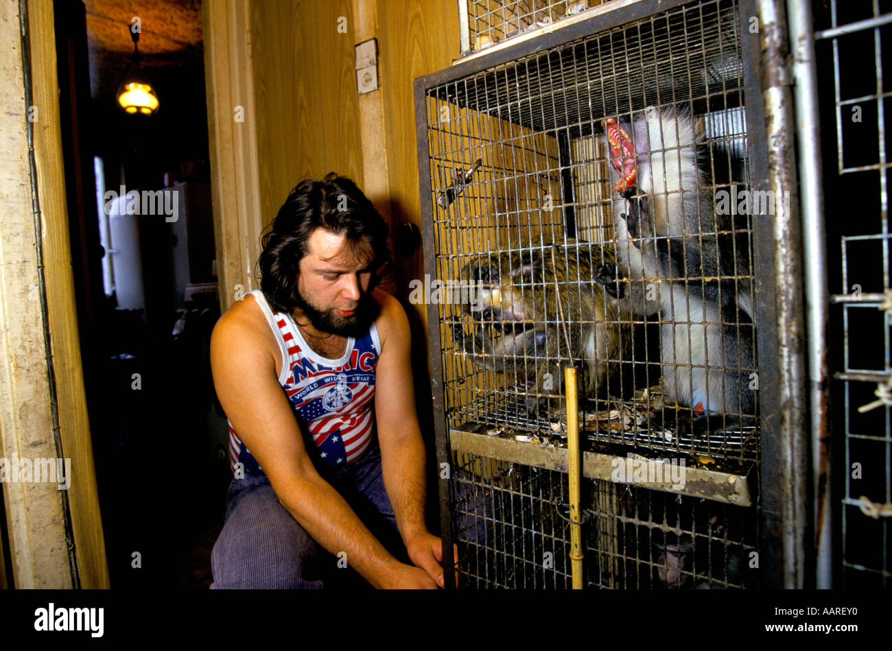 EXOTIC ANIMALS MOSCOW 1995 DIMA YAKUNIN ANIMAL DEALER IN HIS FLAT Stock Photo