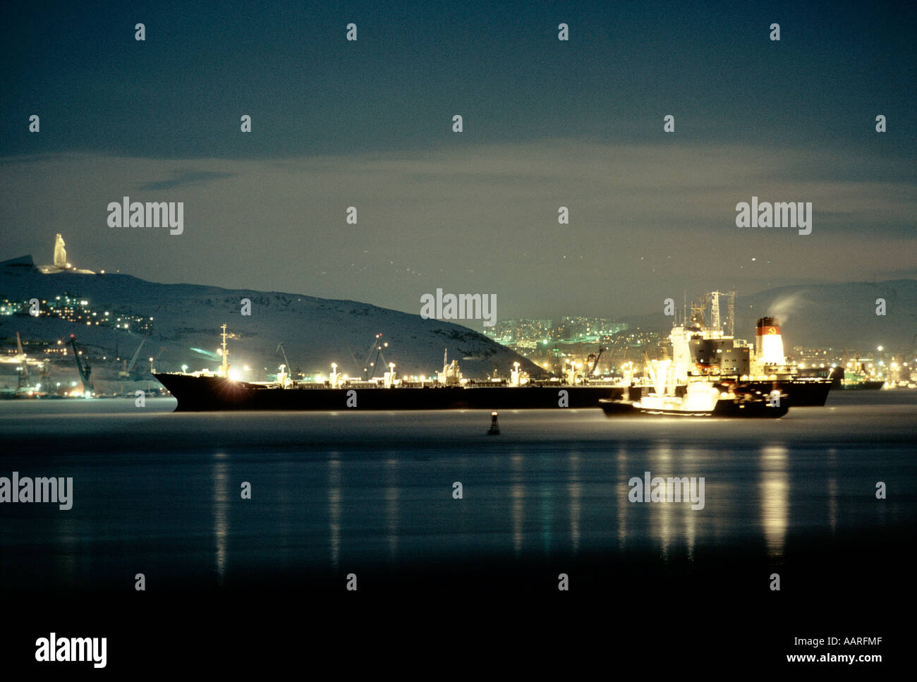 MURMANSK A HUGE CONTAINER SHIP IN MURMANSK HARBOUR AT NIGHT RUSSIA 1990 1990 Stock Photo
