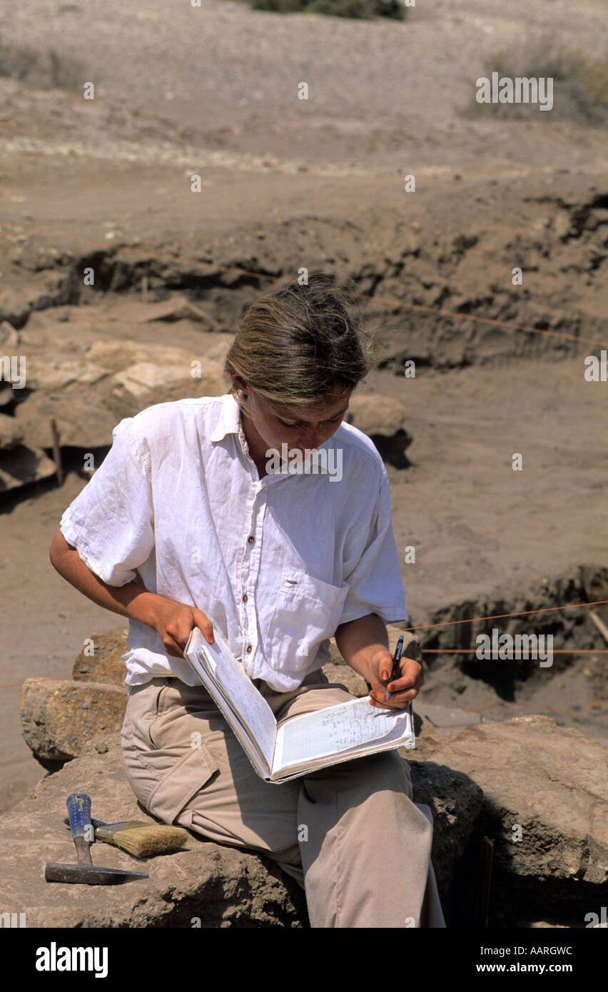 Westerner archeologist woman working  on a site next to the city of Zabid Yemen Stock Photo