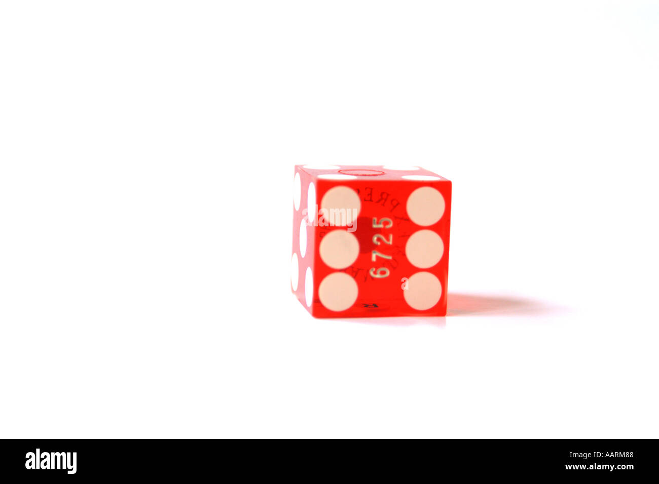 One red dice Stock Photo