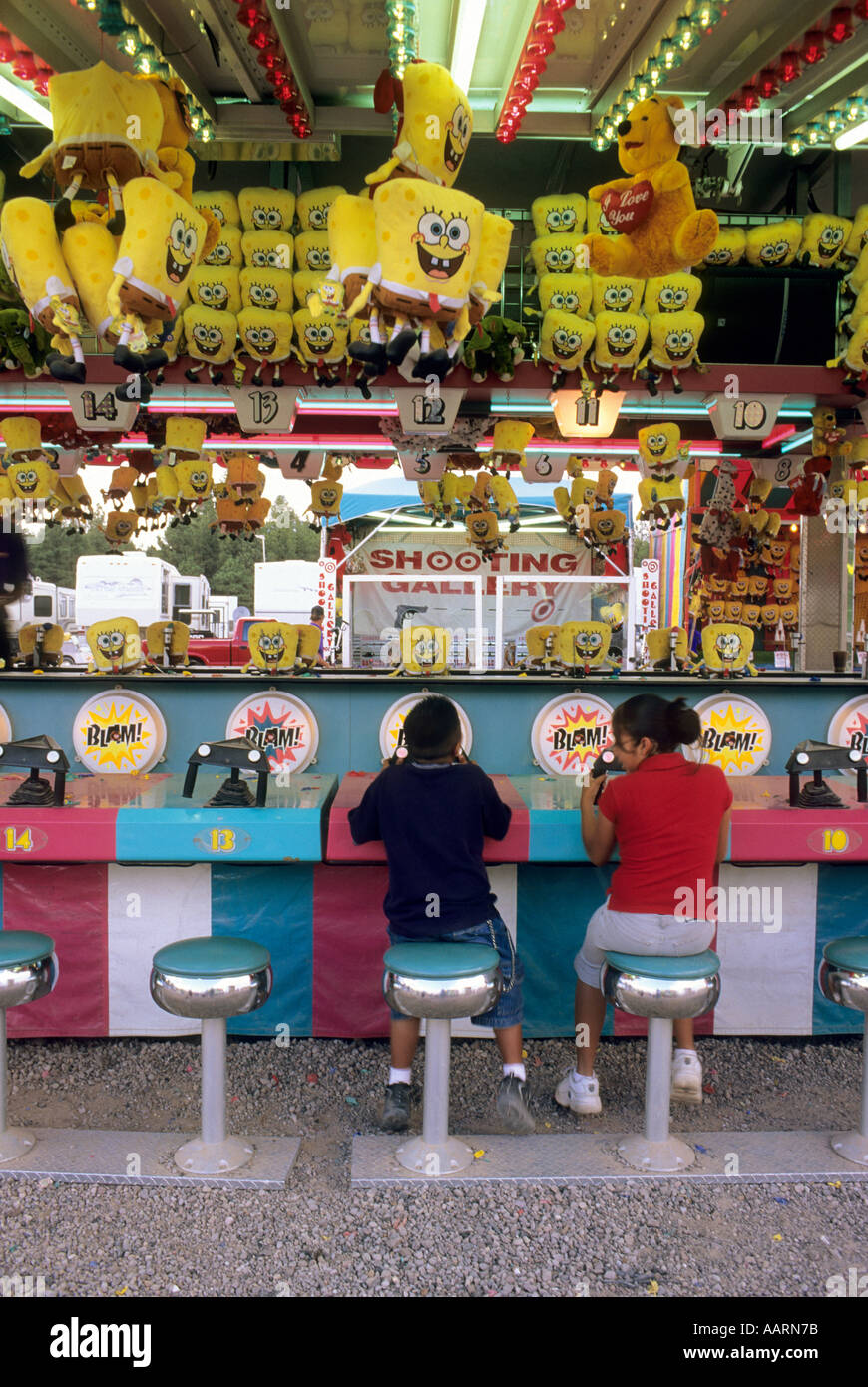 Kids playing shooting game at Coconino County Fair Flagstaff Arizona