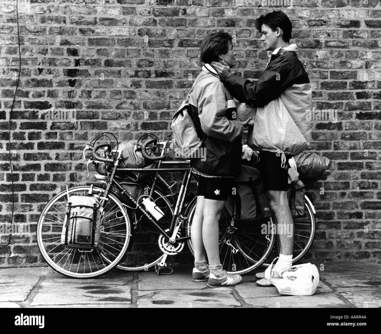 Young couple with bikes on a touring holiday in Yorkshire England Stock Photo