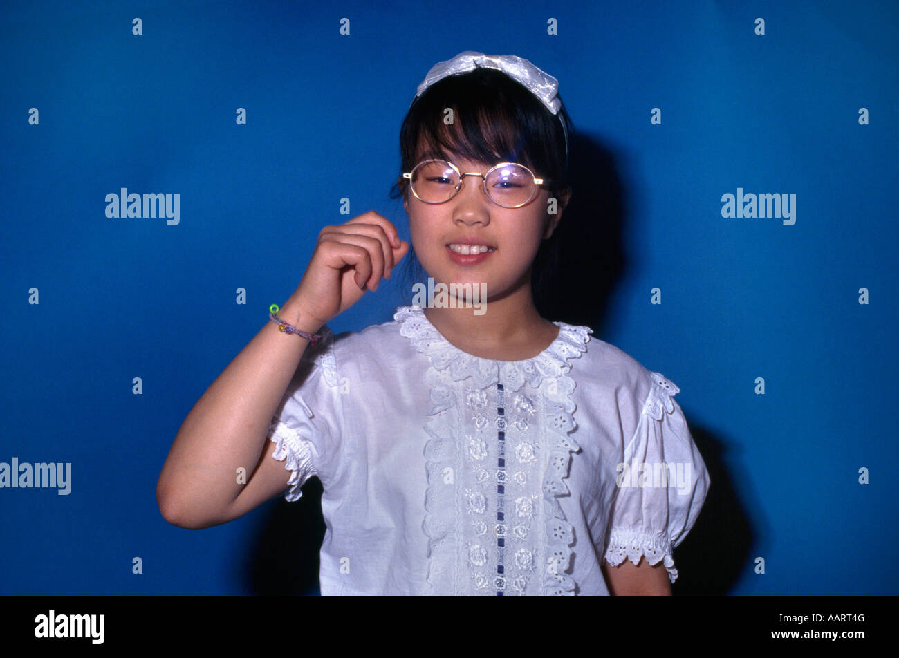 Korean Girl Miming Brushing Teeth Stock Photo Alamy