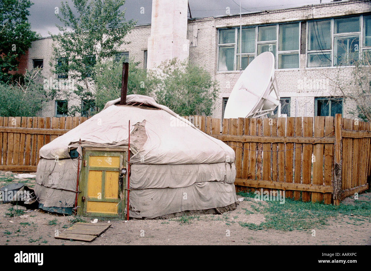 MONGOLIAN RIDE TO CAPITALISM MAKESHIFT HOUSING AND SATELLITE DISH 1999 Stock Photo