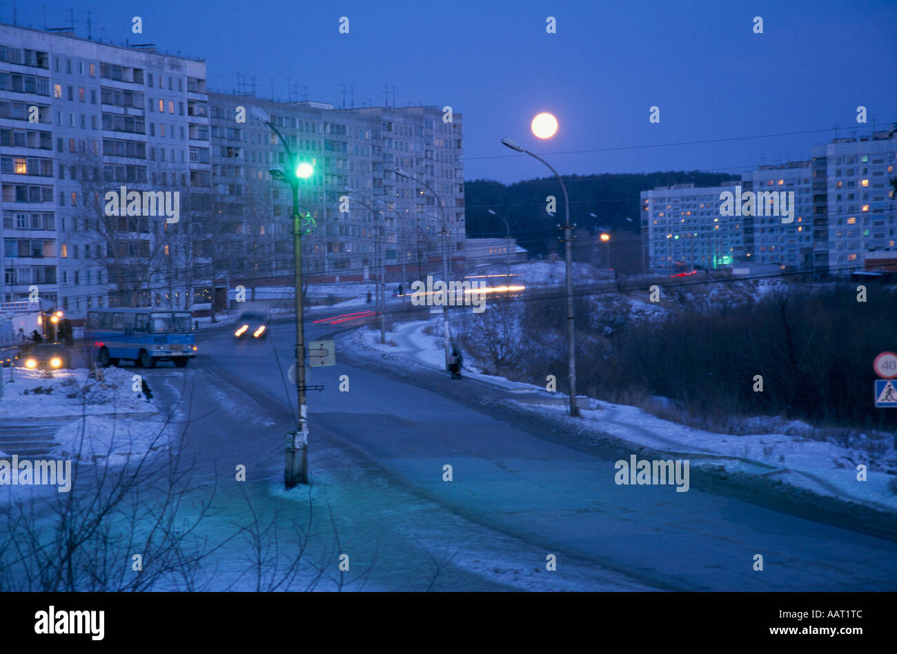 NOVOSIBIRSK CENTRAL SIBERIA THE FULL MOON HANGS ABOVE THE STREETS OF AKADEMGORODOK DURING THE WINTER Stock Photo