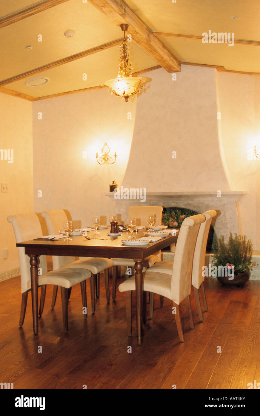 set dining table next to fireplace Stock Photo Alamy