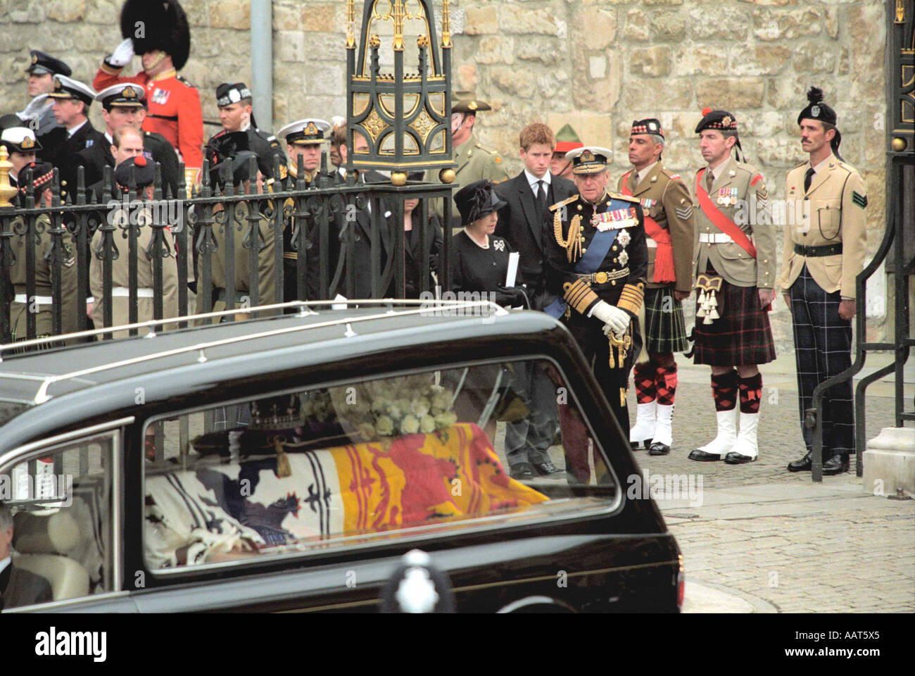 Members of the royal family follow the Queen Mother s coffin to Westminster Abbey 9th April 2002 London Stock Photo