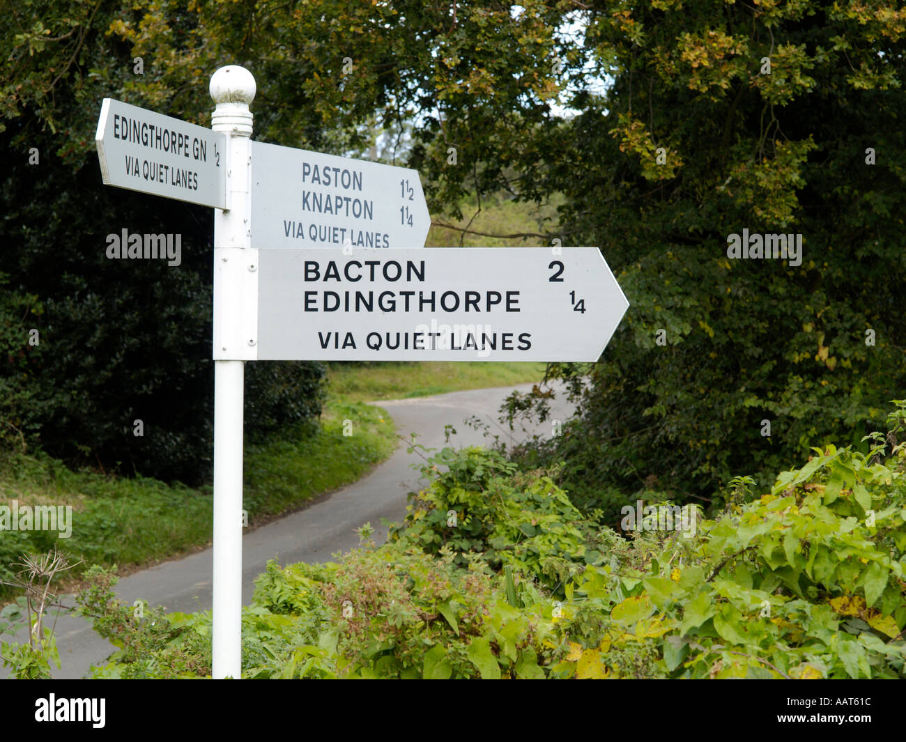 ROAD SIGN SHOWING DIRECTION FOR QUIET LANES AND THE VILLAGES OF PASTON BACTON EDINGTHORPE KNAPTON IN MILES NORFOLK EAST ANGLIA Stock Photo