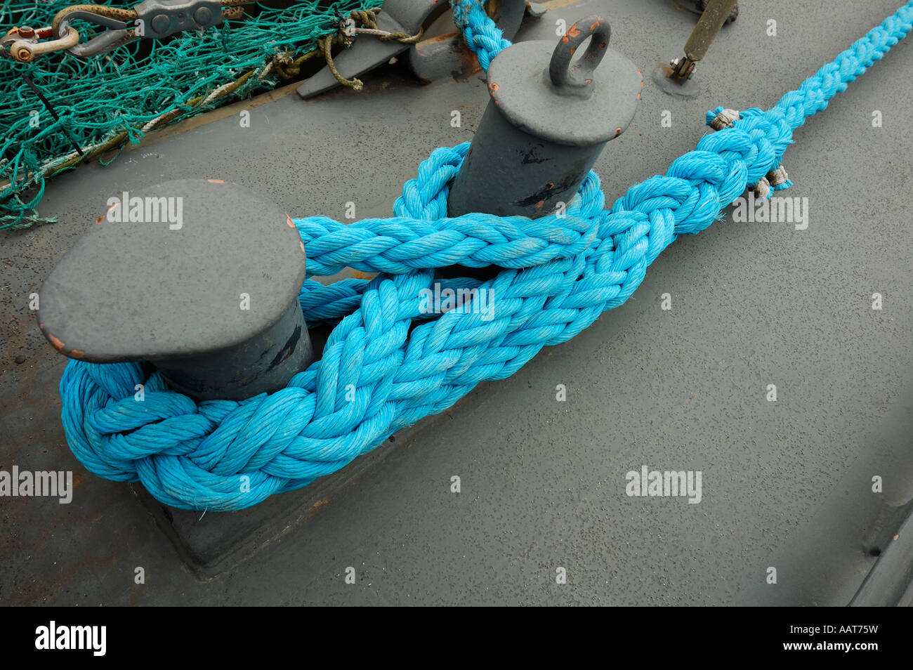 Detail of a ship's mooring line attached to a bollard Stock Photo Alamy