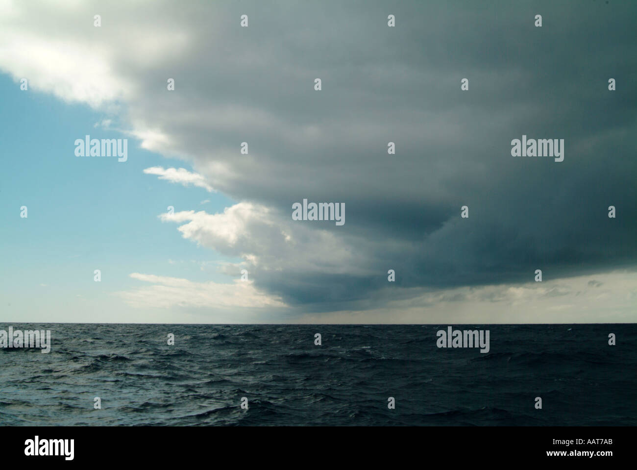 clouds at the leading edge of a weather front over the open ocean