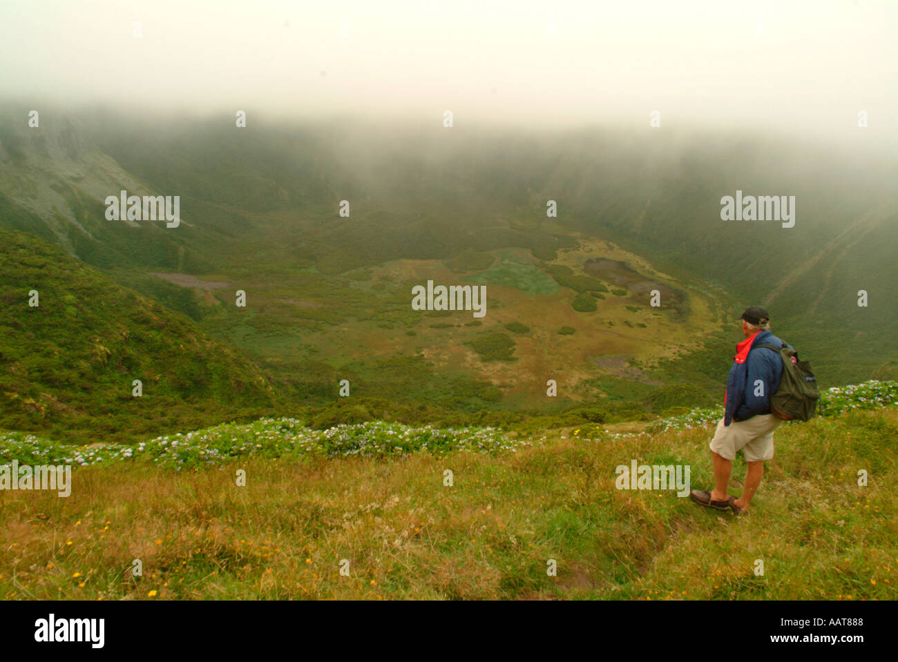A fog enshrouded caldera above Horta on the island of Faial in the Azores Stock Photo