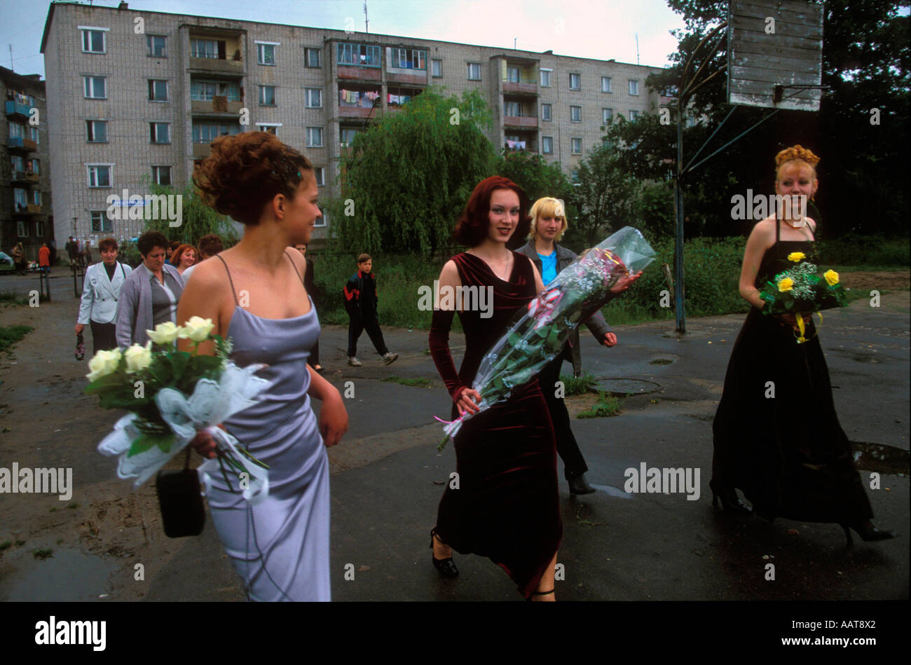 School leavers on the way to their high school graduation ceremony in the town square of Gvardeisk Kaliningrad Stock Photo