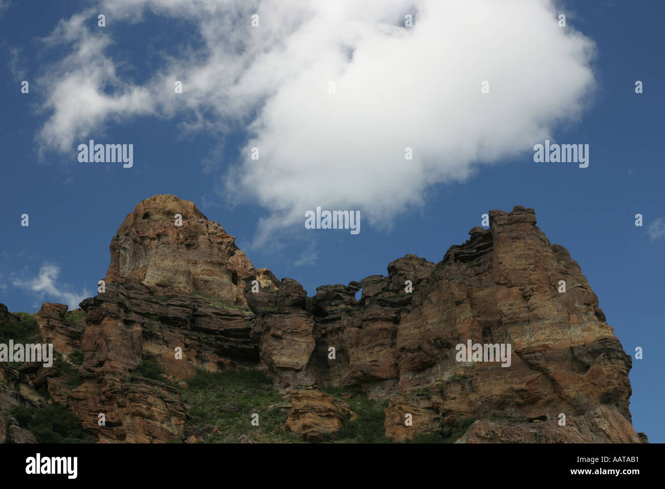 Desert mountain peaks against a deep blue sky Stock Photo - Alamy
