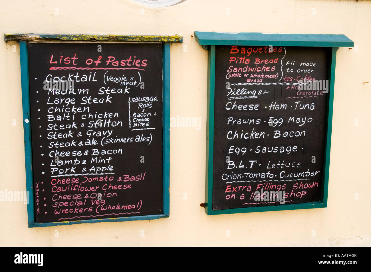 Blackboard menus on wall outside pub Falmouth Cornwall UK Stock Photo
