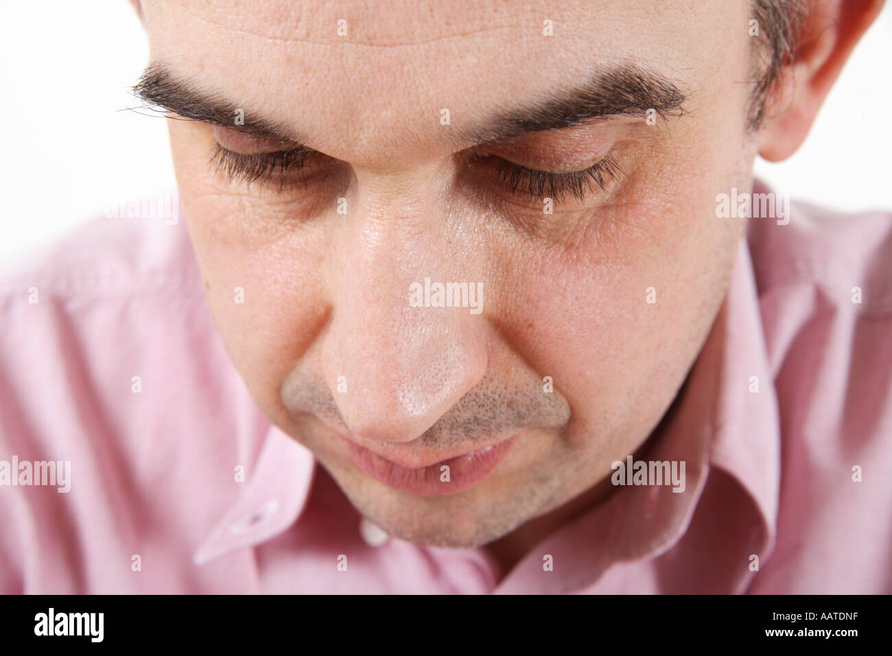 Middle aged man looking sad Stock Photo