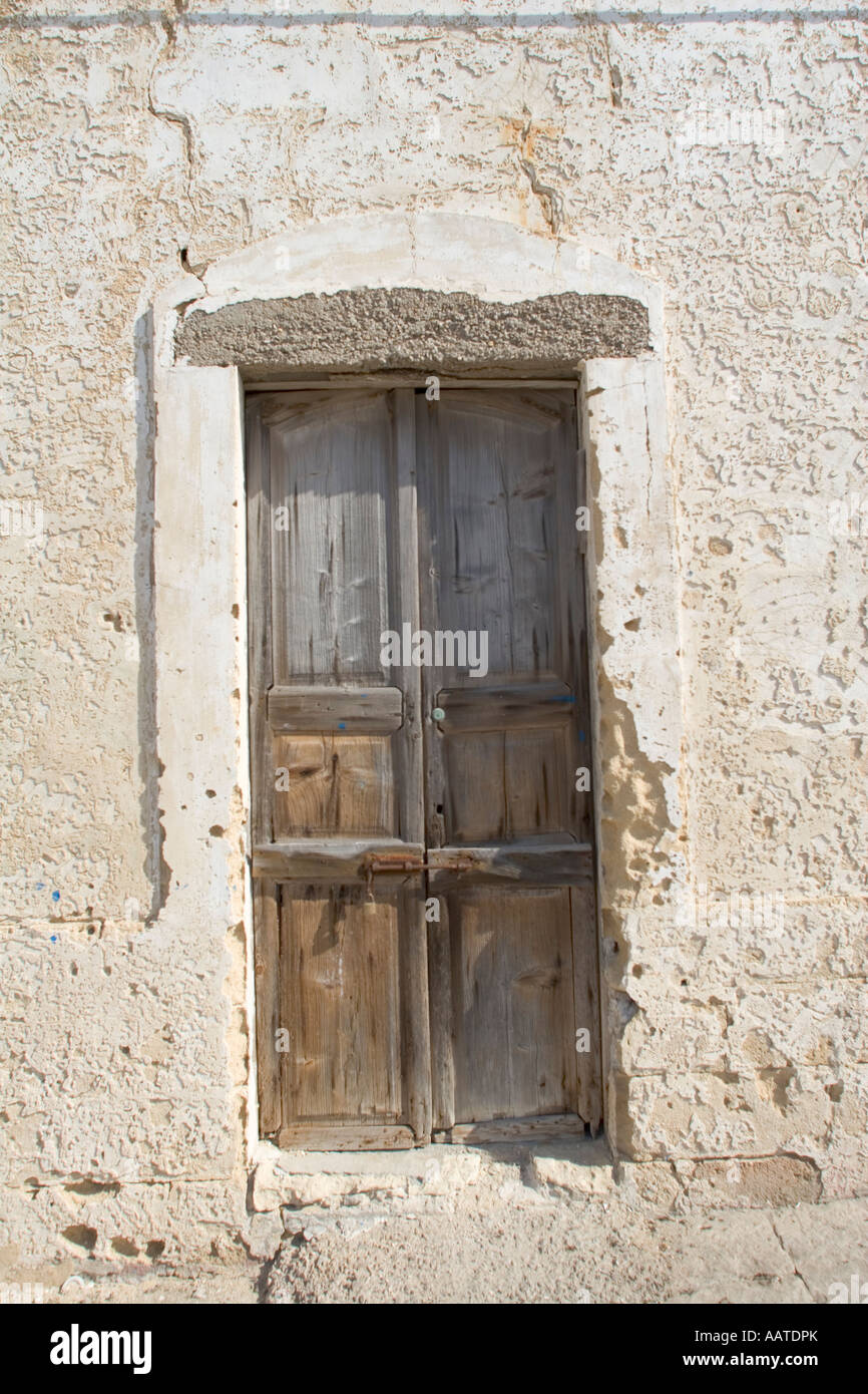 Weathered wooden doors in Gallipoli, Italy Stock Photo