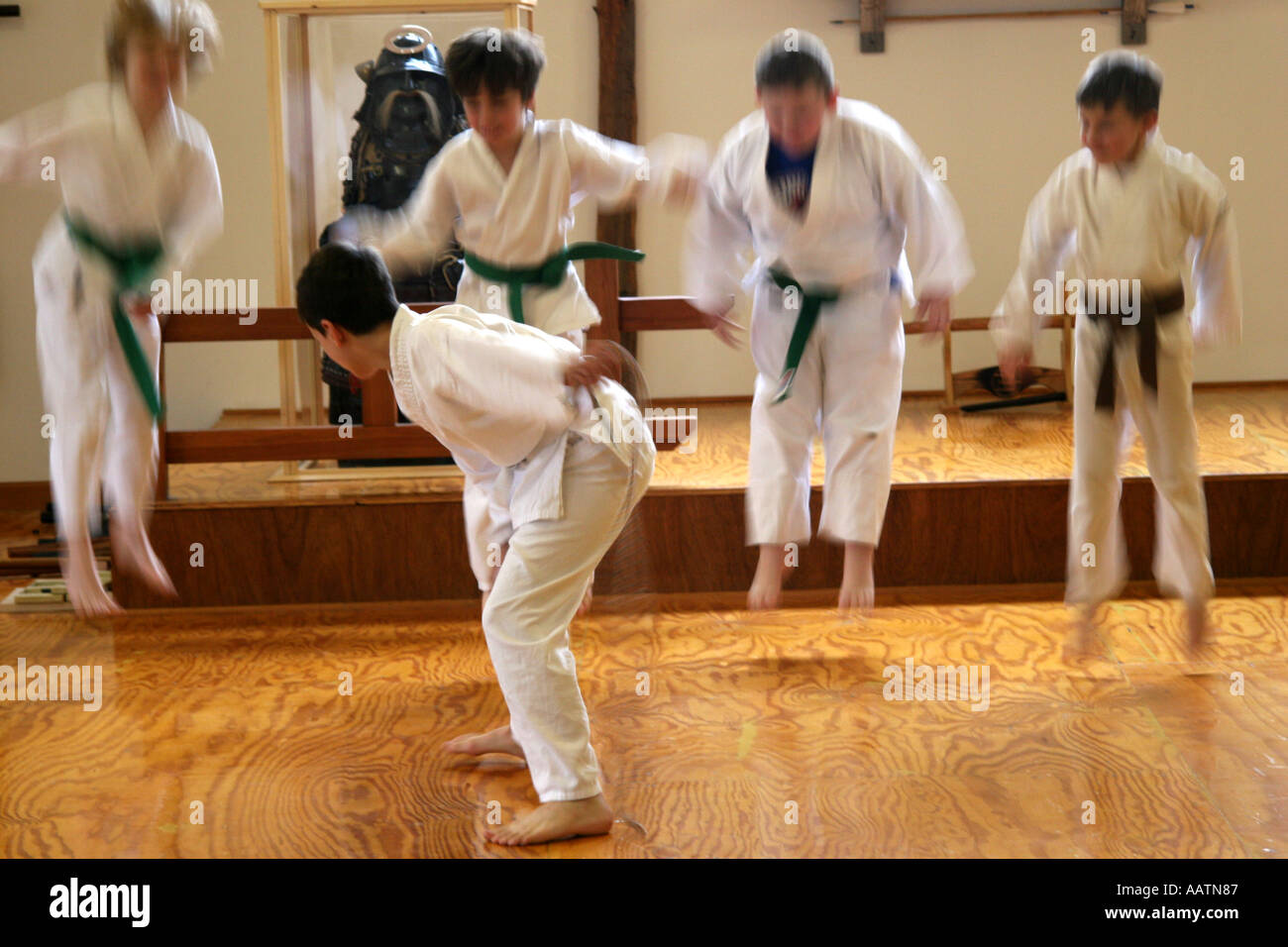 joyful jumping karate kids Stock Photo Alamy