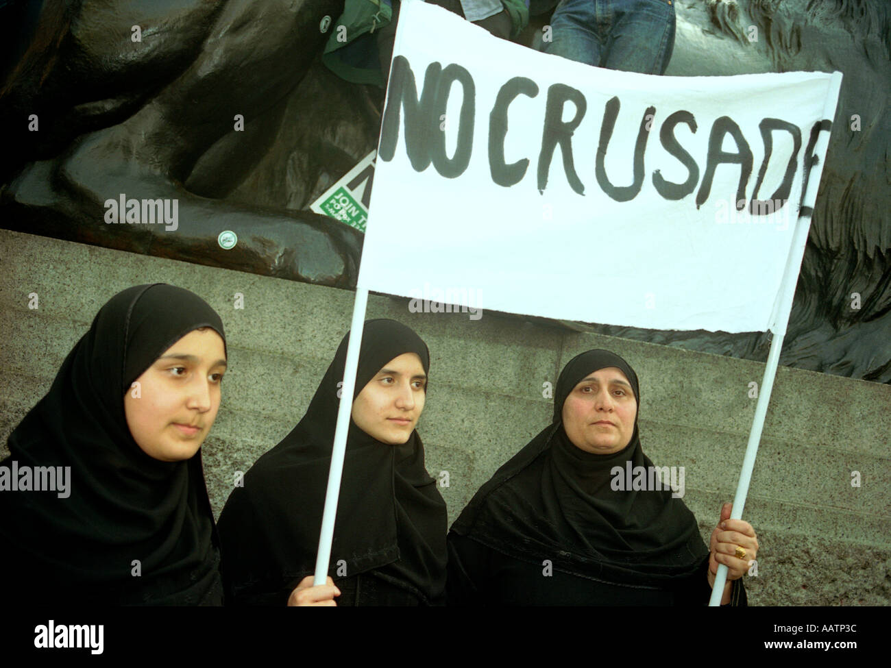 Muslim women demonstrating in Trafalgar Square against the war against Iraq in 2003 Stock Photo