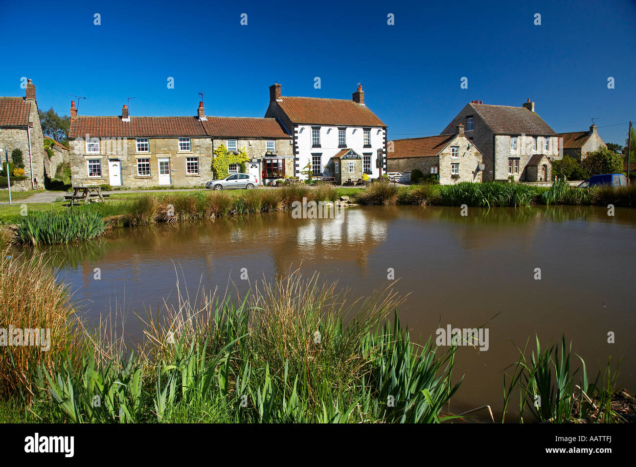 The Mucky Duck Public House and village pond Newton upon Rawcliffe