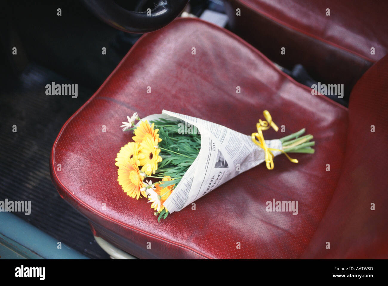 Flower bouquet on car seat Stock Photo Alamy