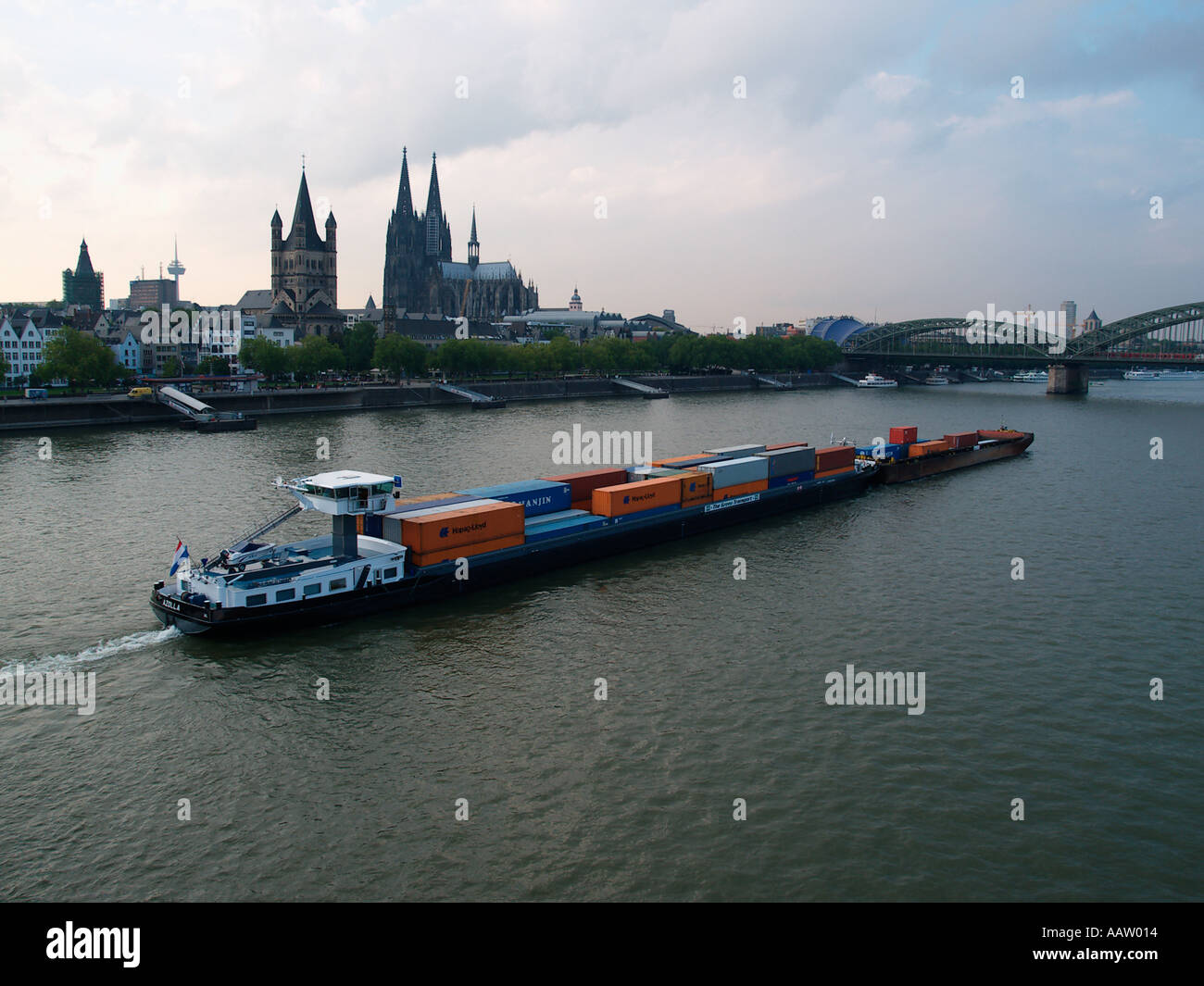 Dutch Rhine barge passing the center of Cologne Germany Stock Photo