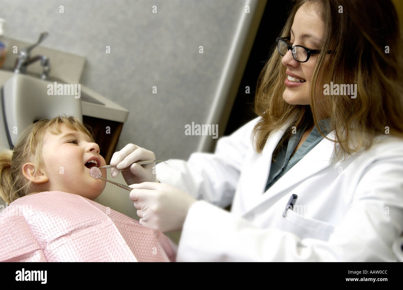 Girl getting dental exam Stock Photo Alamy