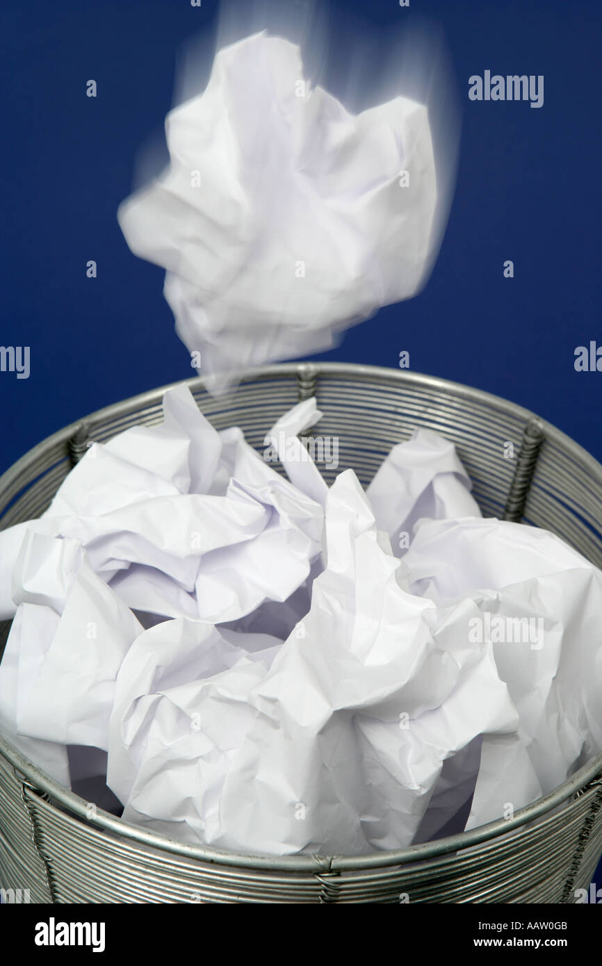 Paper in Waste Paper Basket Stock Photo