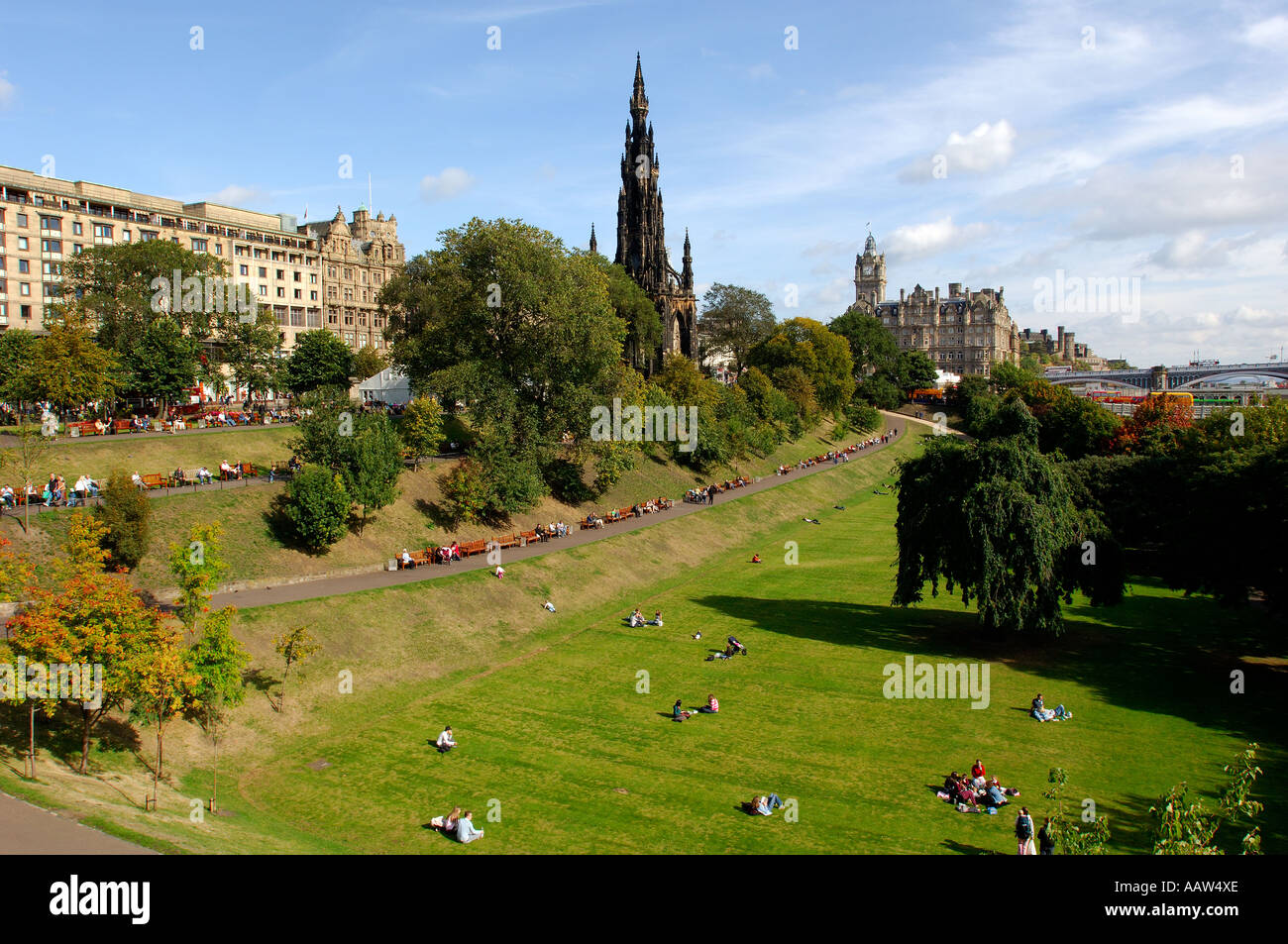 Princes Gardens city of Edinburgh bright sunshine people enjoying the gardens during luch hour Stock Photo