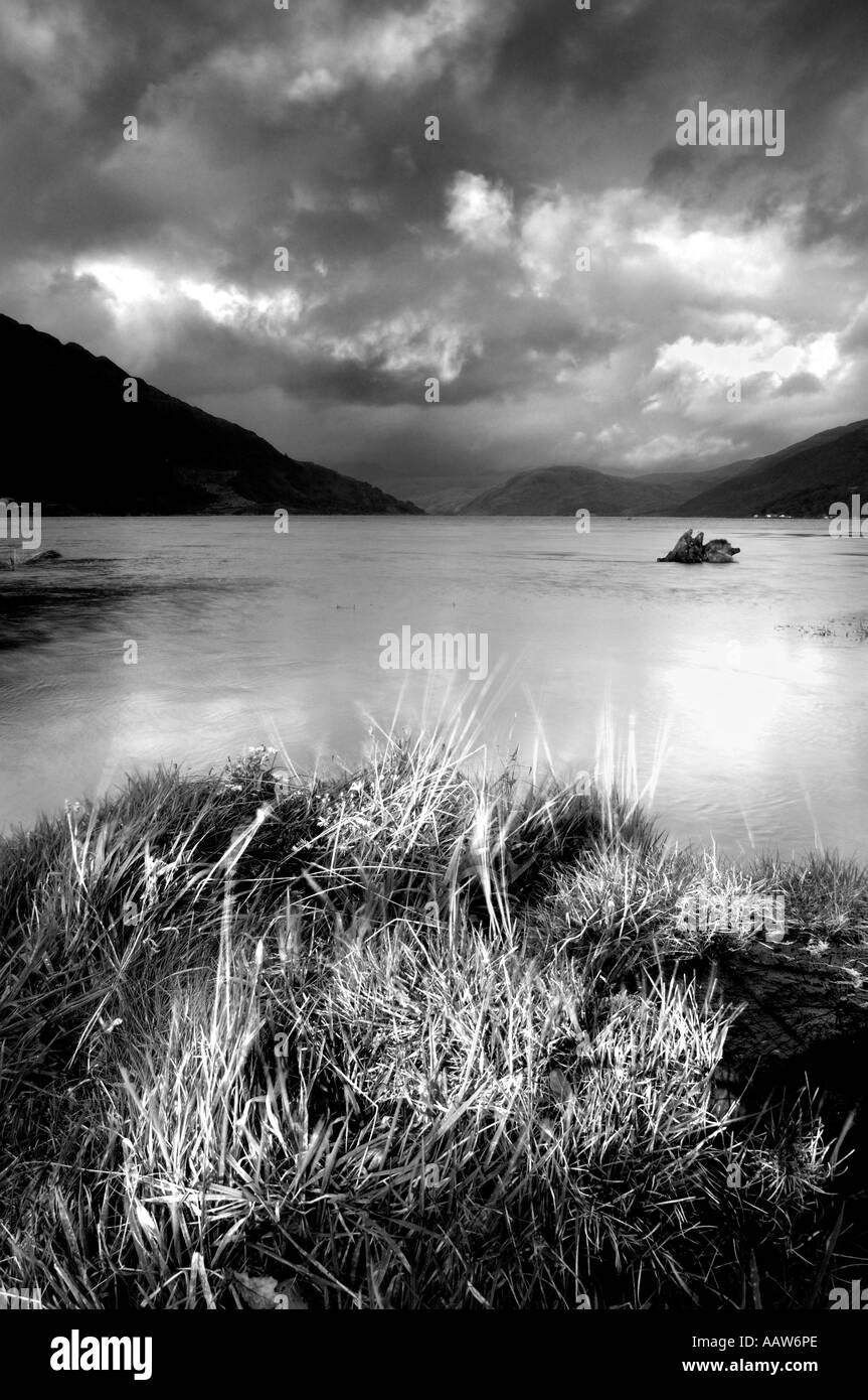 High contrast monochrome late evening view of southern end of Loch Etive near Bonawe Taynuilt in the Scottish Highlands Stock Photo