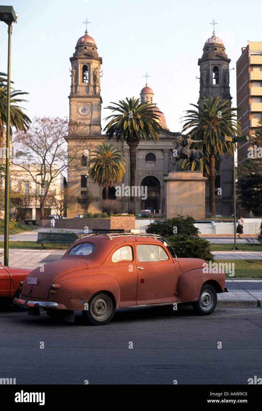 Car and church at Mercedes Uruguay Stock Photo