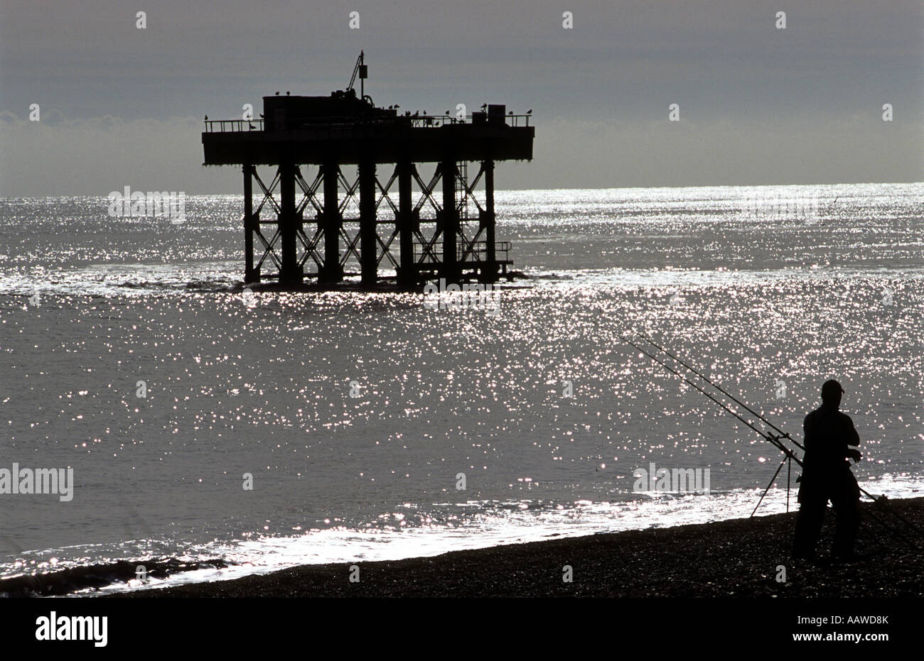 Fishing from the beach at Sizewell, Suffolk, UK. Stock Photo
