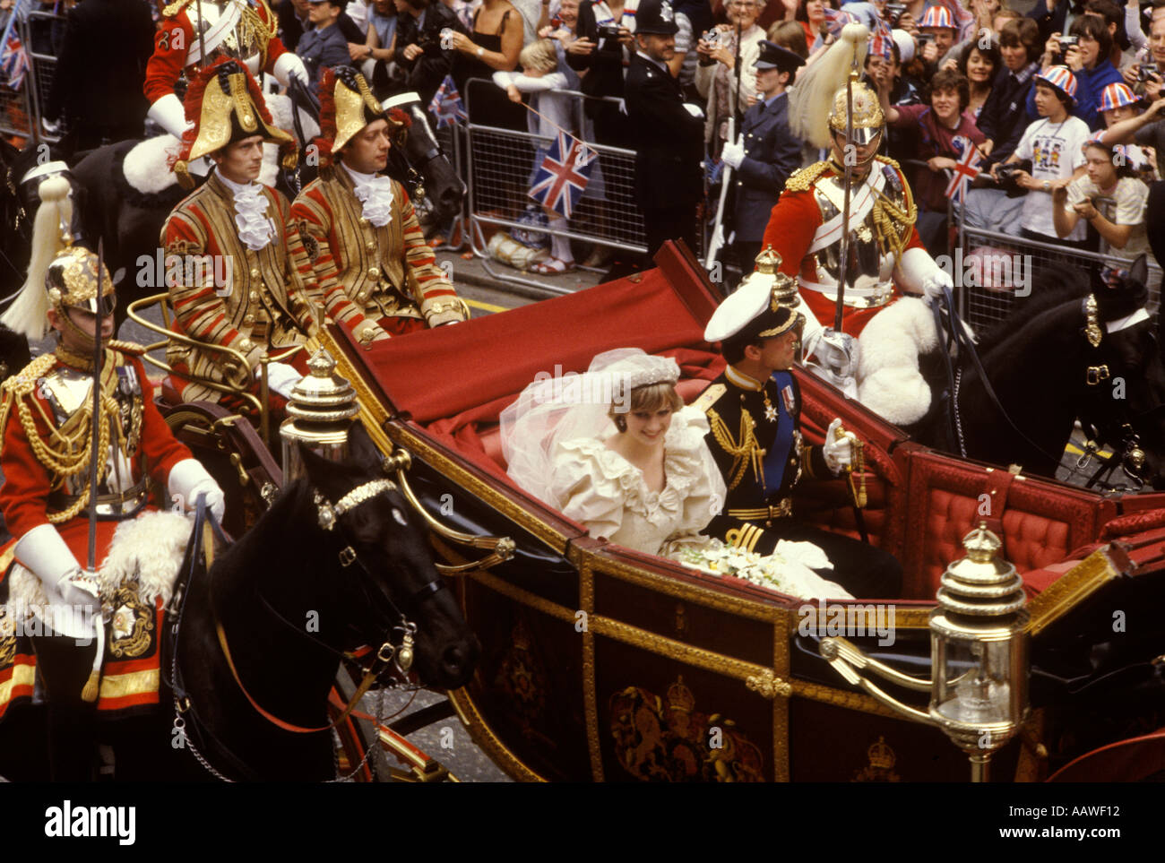 Prince Charles Lady Diana Spencer royal wedding crowds London.  29th July 1981 open carriage down The Mall  returning to Buckingham Palace. 1980S UK Stock Photo
