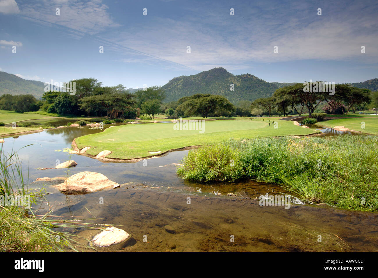 The ninth hole of the Gary Player golf course at the Sun City resort in South Africa. Stock Photo