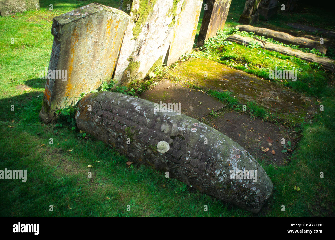 10th century viking gravestone shaped like upturned boat Luss Church yard Loch Lomondside Scotland Europe Stock Photo