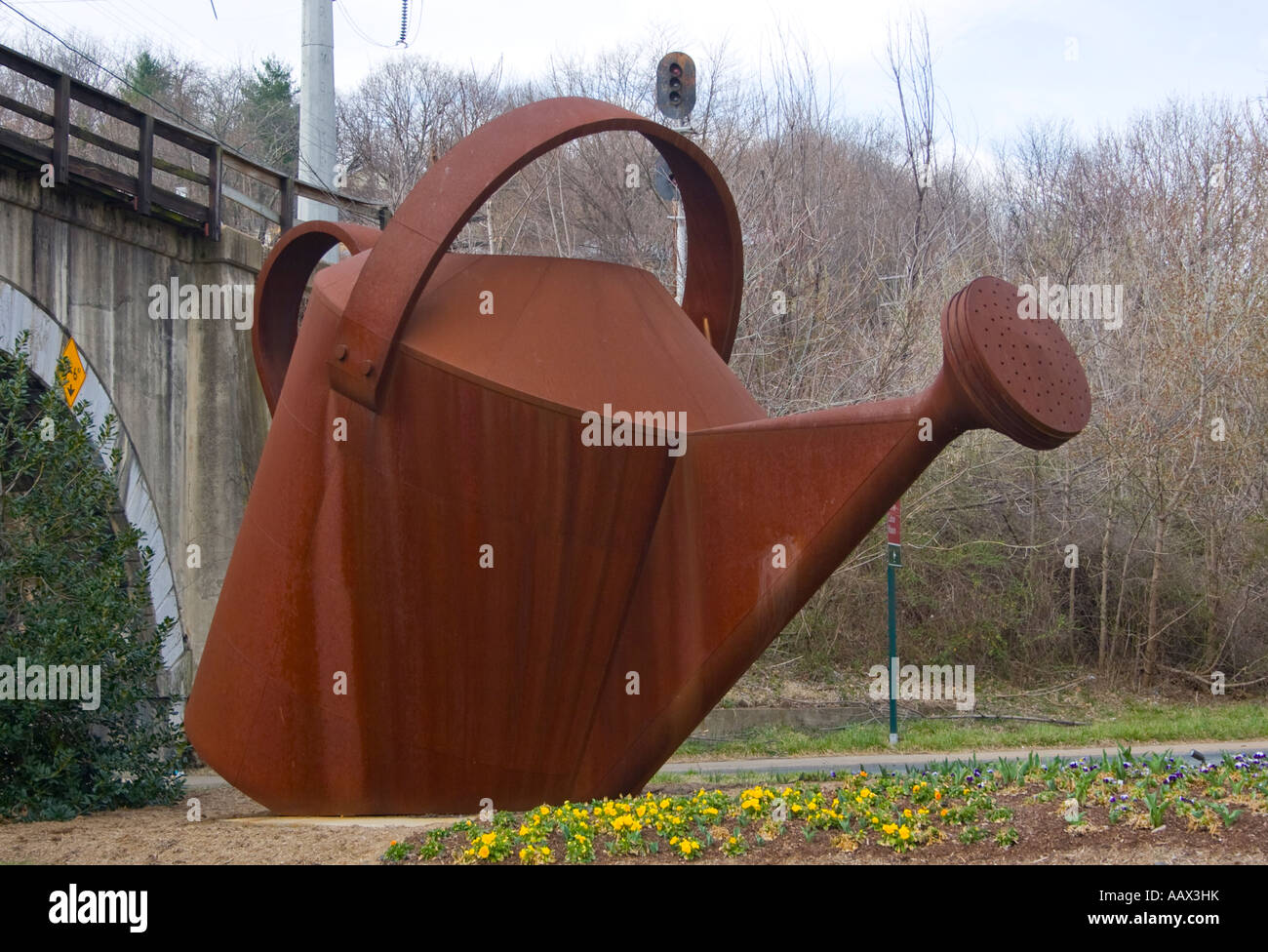 Giant Watering Can at an intersection in Staunton Virginia Stock Photo