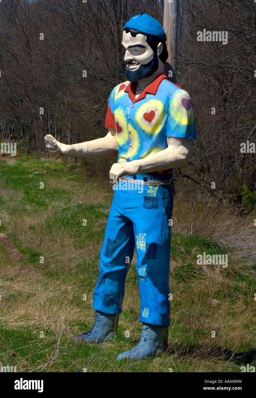 Tie Dye Hippie Muffler Man at Yasgurs Farm site of the Woodstock reunion in Bethel New York