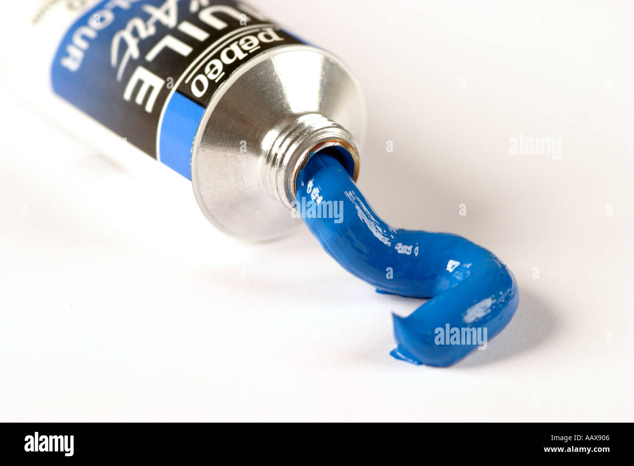 Tube of blue paint on a white background Stock Photo - Alamy