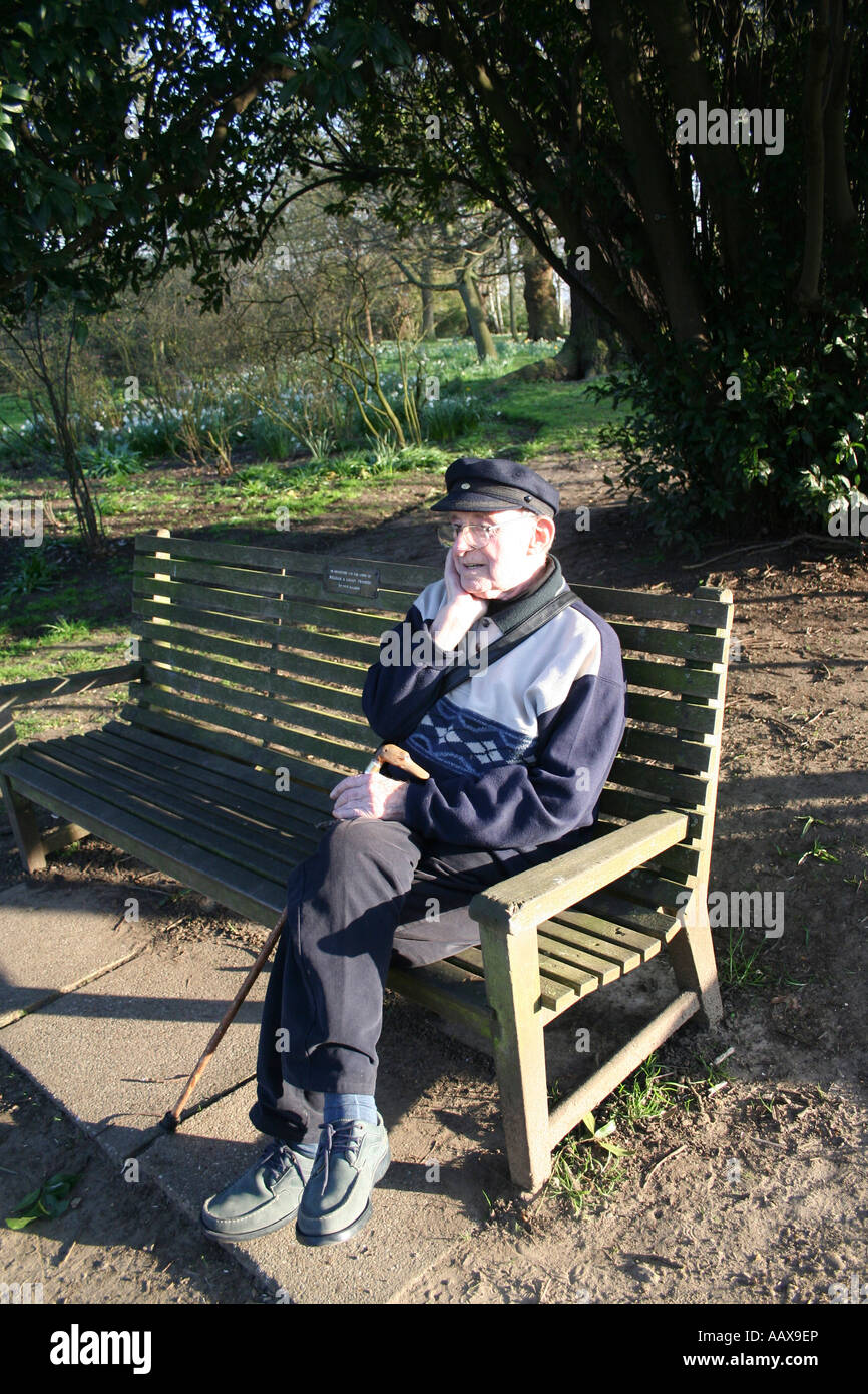 Elderly man sitting along hi-res stock photography and images - Alamy
