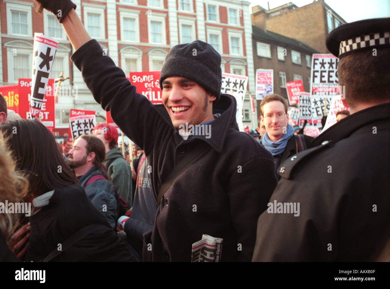 Student protest march through London demonstrating against government policy of privatisation and student fees Stock Photo