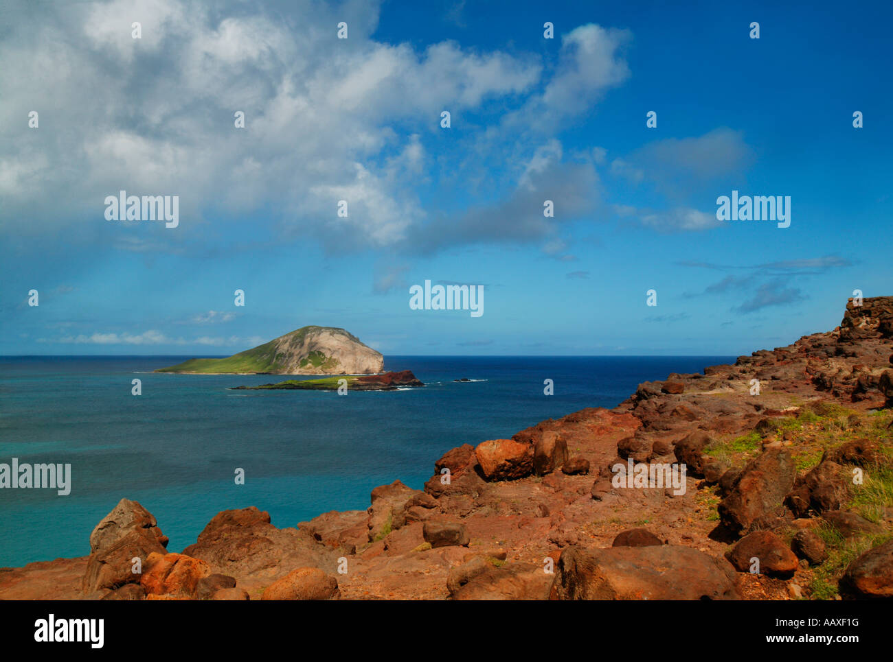 Rocky shore with distant clouds hi-res stock photography and images - Alamy