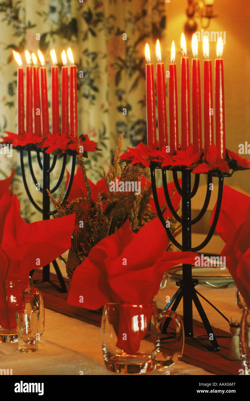Red candles help brighten Christmas holidays Stock Photo