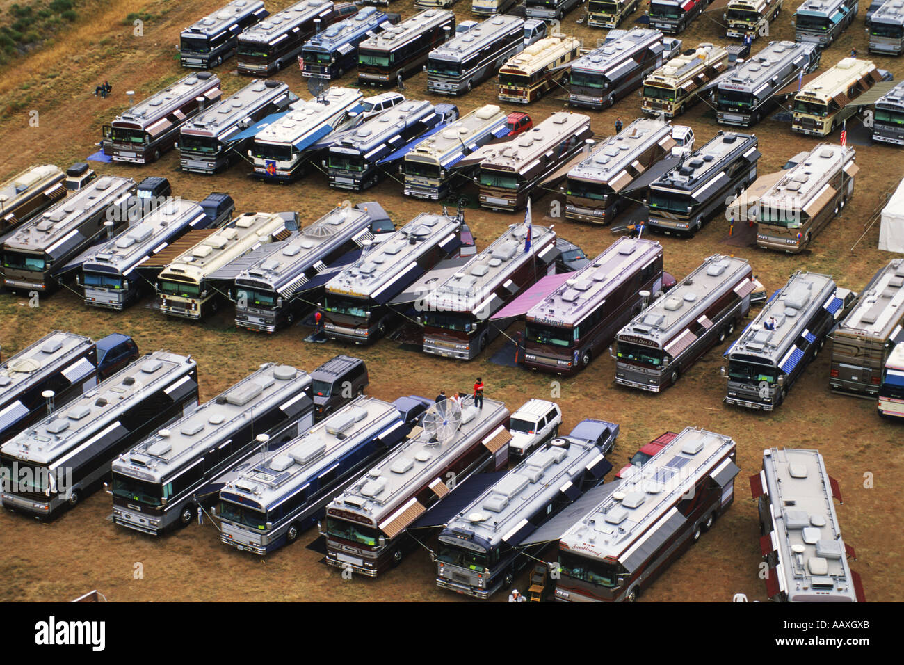 Rows of big expensive RVs in parking lot at Albuquerque Balloon
