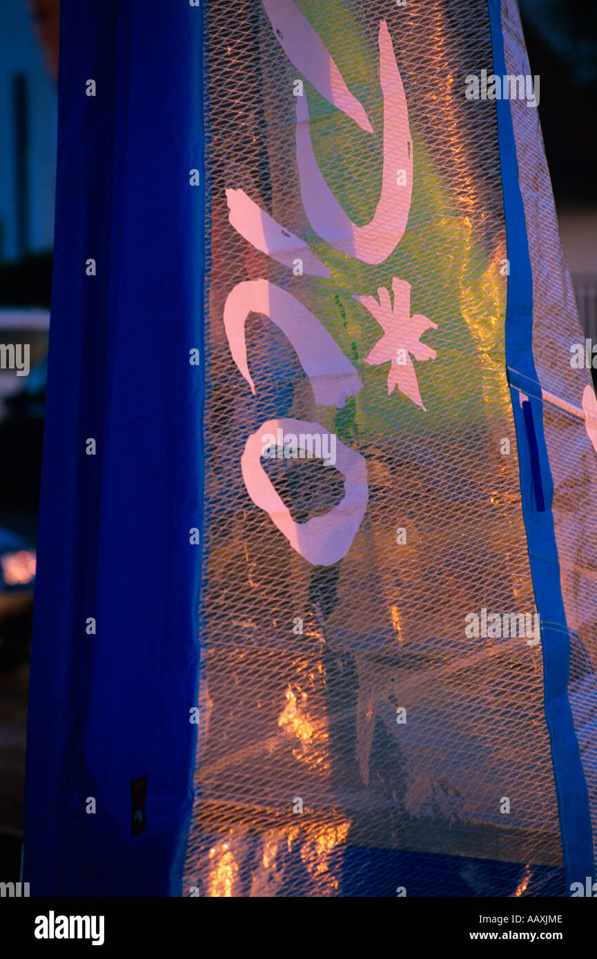 Pico dinghy sail in evening light, Gurnard sailing club, Cowes, Isle of
