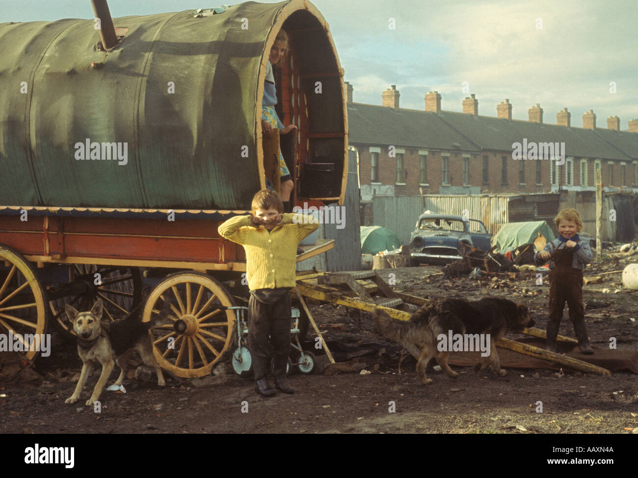 Gypsy family Mother and two children and traditional caravan Belfast ...