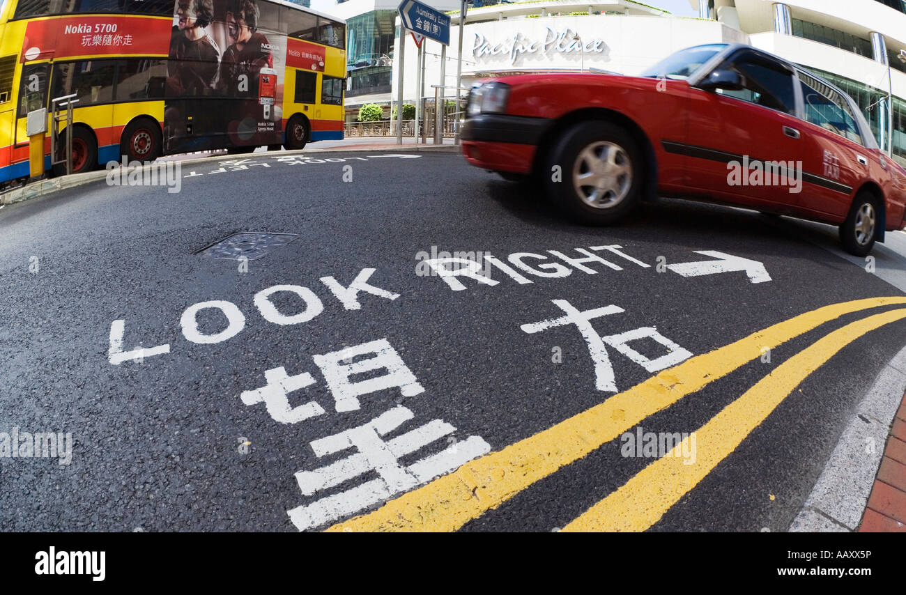"Chinese and English traffic sign on a road in Hong Kong Stock Photo