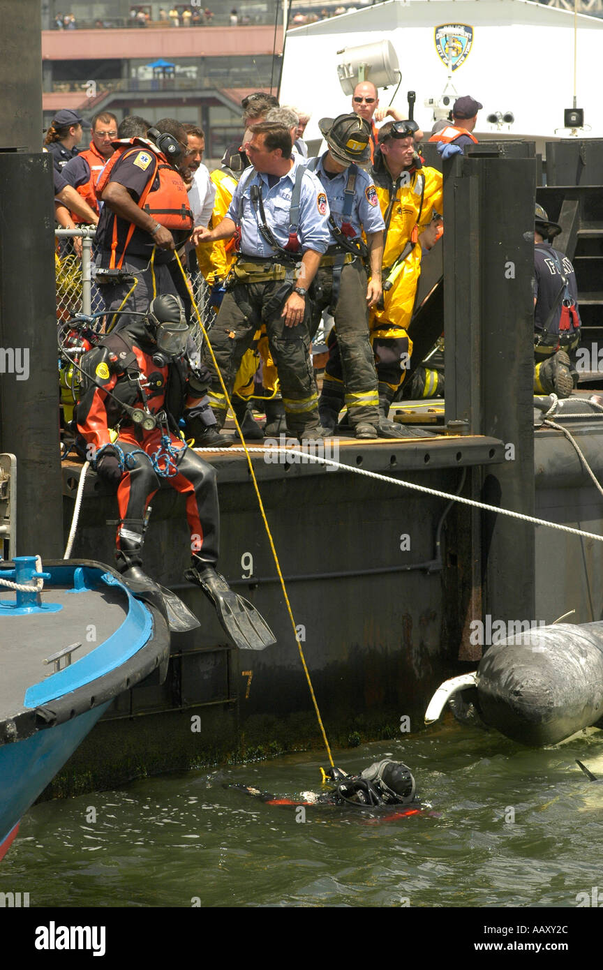 First responders at the wreckage of a helicopter that crashed into the