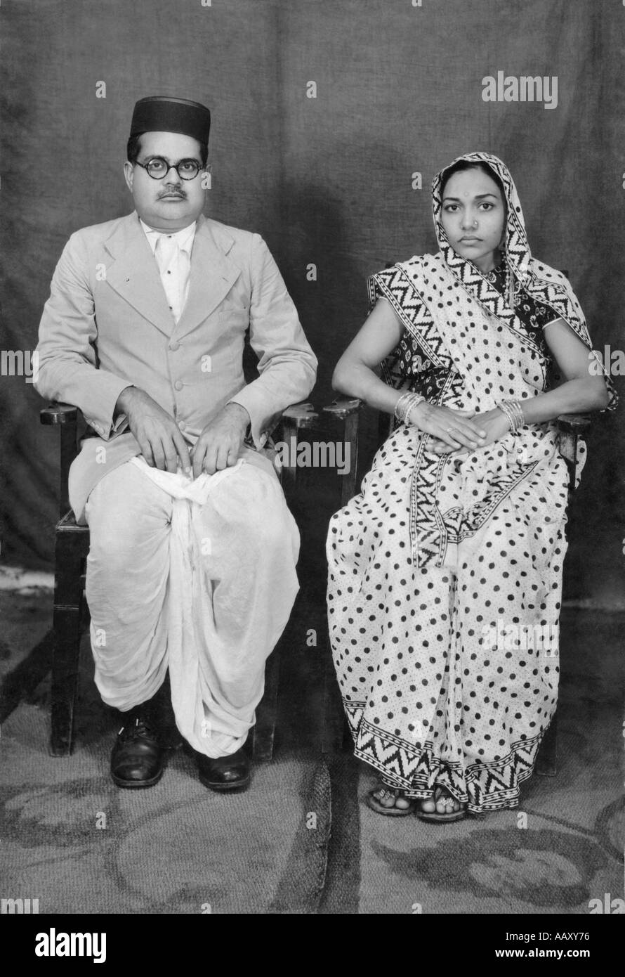 Indian couple old photo sitting on chair village mahangwa district narsinghpur madhya pradesh india model