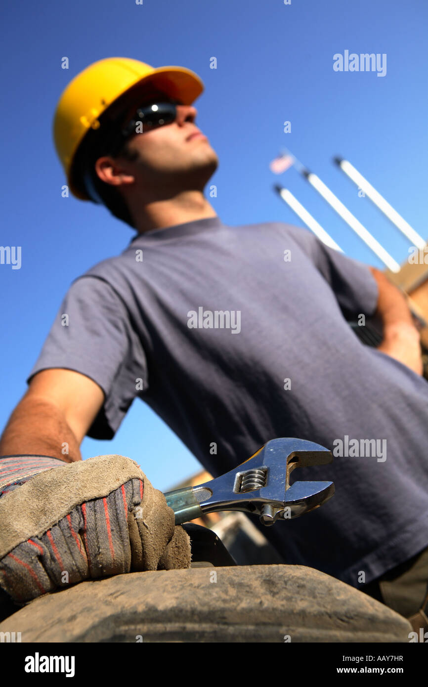 Person Using Wrench Construction worker with wrench in hand Stock Photo - Alamy