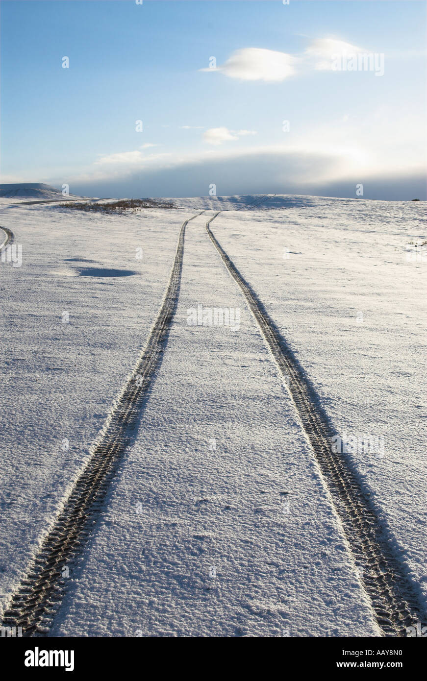 UK Wales Powys tracks through wintery landscape Stock Photo