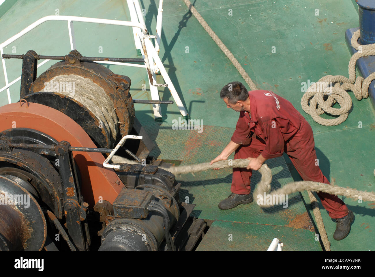 Pulling ropes on a boat Stock Photo Alamy